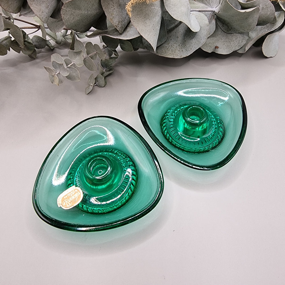 Pair of Bohemia emerald green glass candle holders made in Czechoslovakia with dish design.