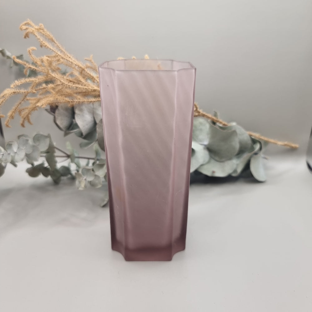 Art Deco purple frosted glass vase with tall geometric shape and soft swirl pattern.