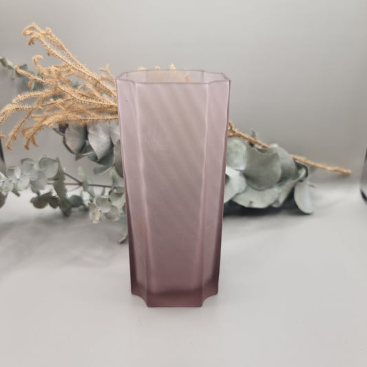 Art Deco purple frosted glass vase with tall geometric shape and soft swirl pattern.