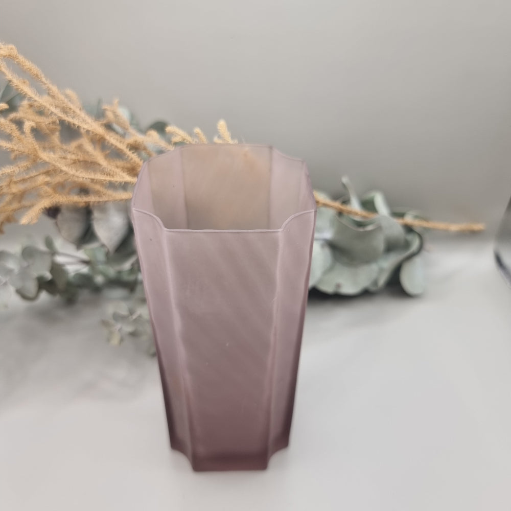 Art Deco purple frosted glass vase with tall geometric shape and soft swirl pattern.