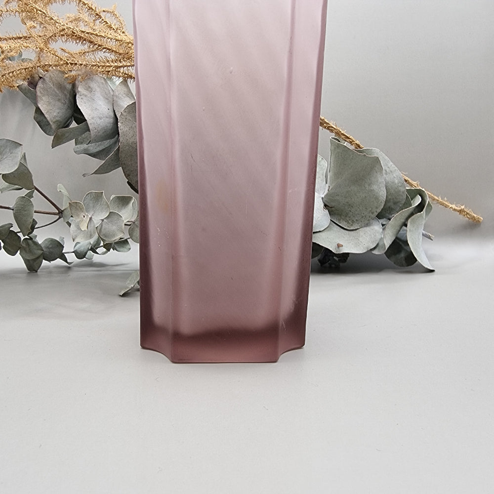 Art Deco purple frosted glass vase with tall geometric shape and soft swirl pattern.