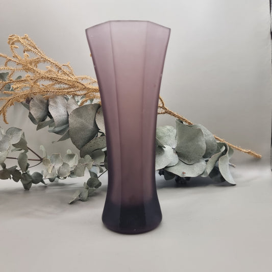 Tall Art Deco purple frosted glass bud vase with flared geometric shape.