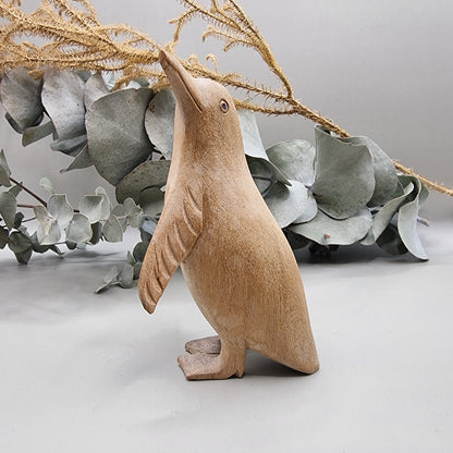 Hand carved wooden penguin