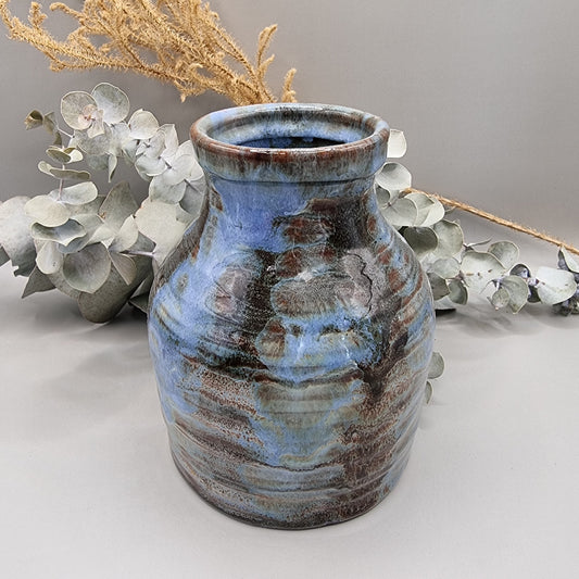 Handmade pottery vase with blue and brown glaze