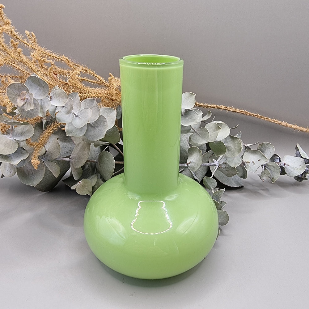 Lime green vintage cased glass vase with bulbous base and tall neck