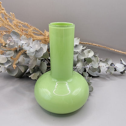 Lime green vintage cased glass vase with bulbous base and tall neck