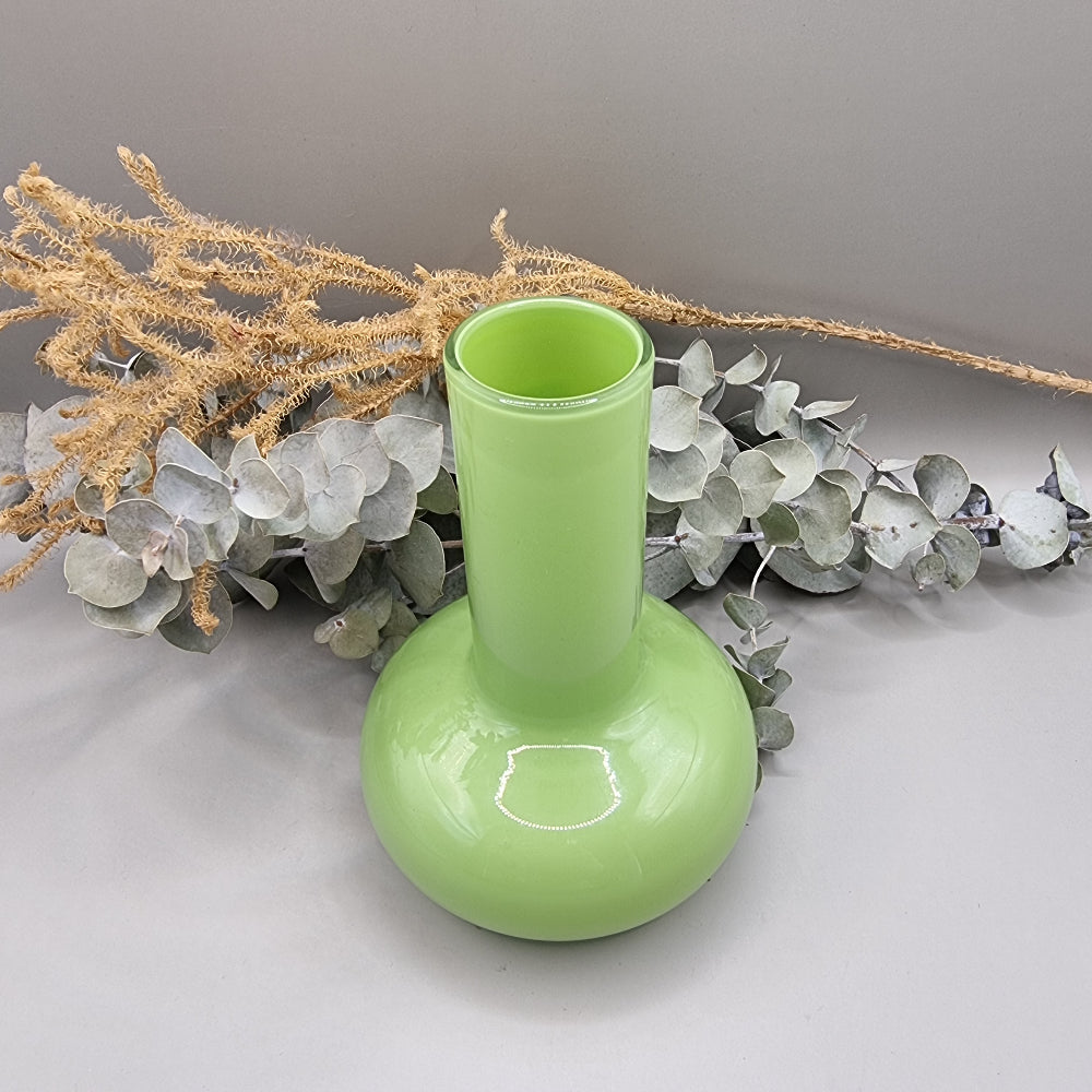 Lime green vintage cased glass vase with bulbous base and tall neck