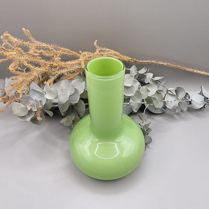 Lime green vintage cased glass vase with bulbous base and tall neck