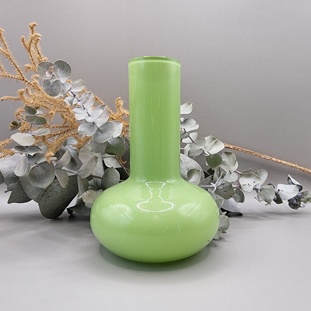 Lime green vintage cased glass vase with bulbous base and tall neck