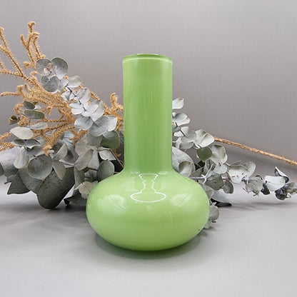 Lime green vintage cased glass vase with bulbous base and tall neck