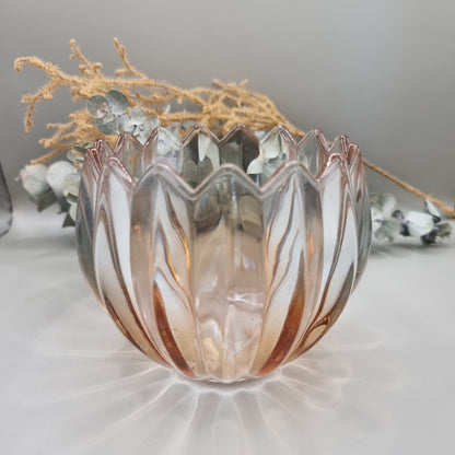 Pair of blush peach scalloped glass tealight holders with petal edge and vertical ridging.