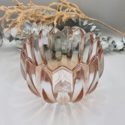 Pair of blush peach scalloped glass tealight holders with petal edge and vertical ridging.