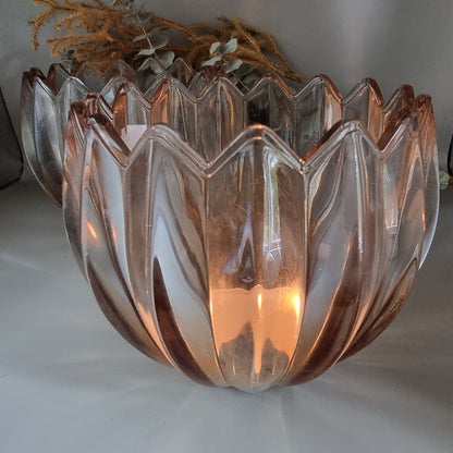 Pair of blush peach scalloped glass tealight holders with petal edge and vertical ridging.