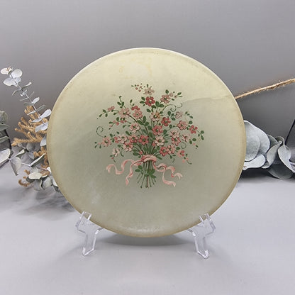 Italian alabaster plate with hand-painted pink floral bouquet and ribbon.