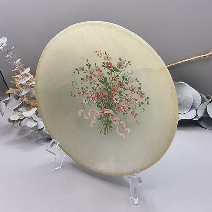 Italian alabaster plate with hand-painted pink floral bouquet and ribbon.