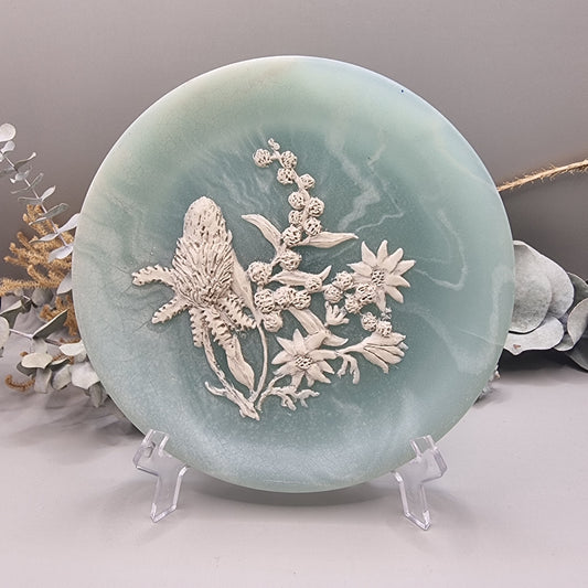 Green marlestone plaque with raised native Australian floral design, made in Australia.