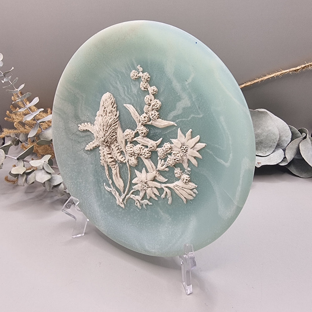 Green marlestone plaque with raised native Australian floral design, made in Australia.