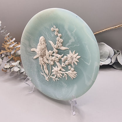 Green marlestone plaque with raised native Australian floral design, made in Australia.