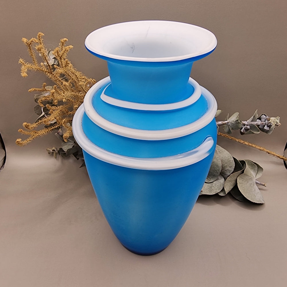 Matte blue glass vase with white banded neck and flared rim, retro art glass design