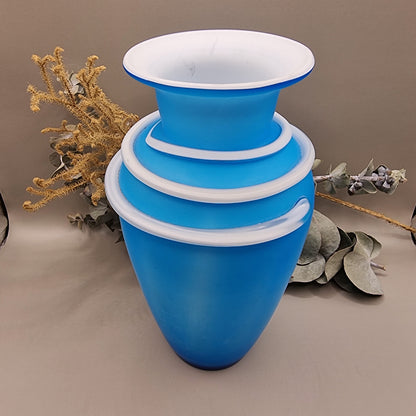 Matte blue glass vase with white banded neck and flared rim, retro art glass design
