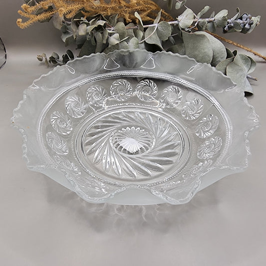 Pressed glass bowl with frosted scalloped edge and swirl design centre