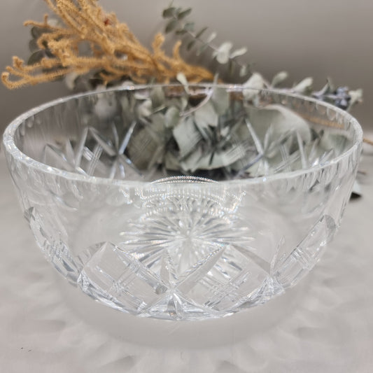 Deep pressed glass bowl with crosshatch pattern and starburst base