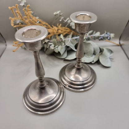 Pair of tall vintage silver candle holders with tapered stems