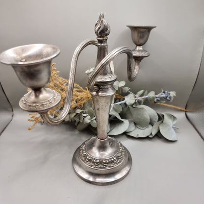 Vintage silver-plated 2 arm candelabra with ornate base and flame finial