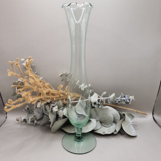 Tall vintage green glass trumpet vase with scalloped rim
