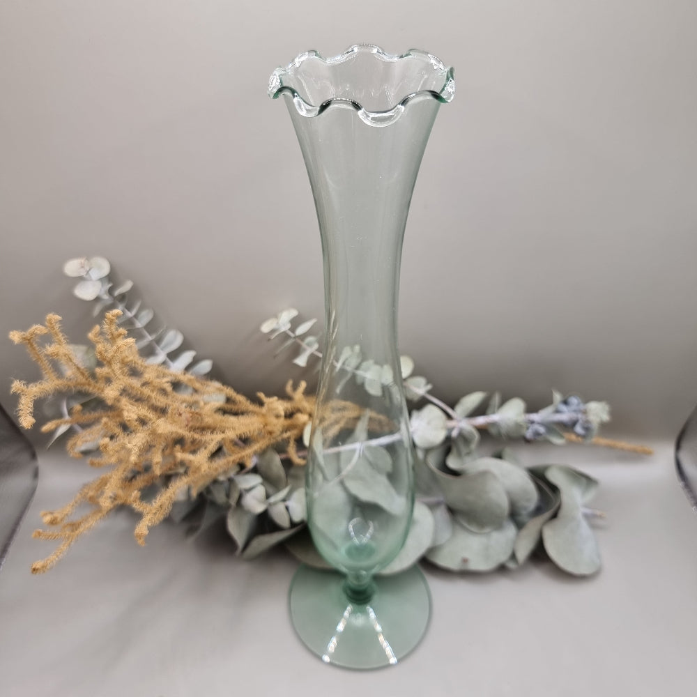 Tall vintage green glass trumpet vase with scalloped rim