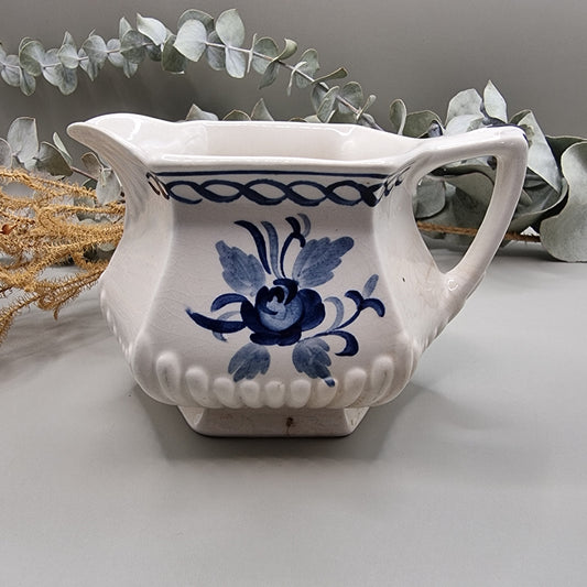 William Adams & Sons 'Baltic' blue and white creamer jug with floral design and scalloped spout.