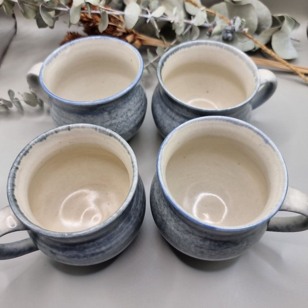 Set of 4 pottery mugs