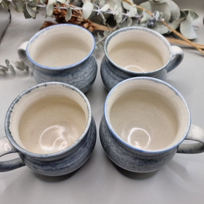 Set of 4 pottery mugs