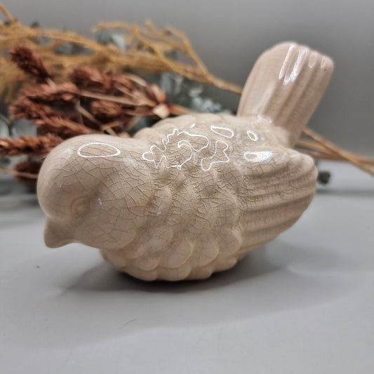 Cream ceramic bird figurine with crackle glaze finish