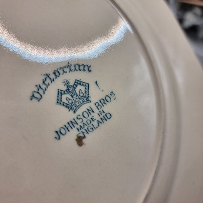 Johnson Bros Victorian square plate with floral centre and corner bouquets, gold edge and brown scroll detail.