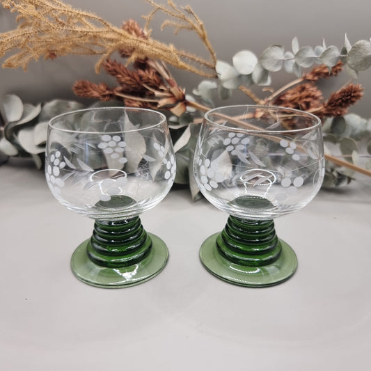 Pair of vintage etched wine glasses with green spiral bases