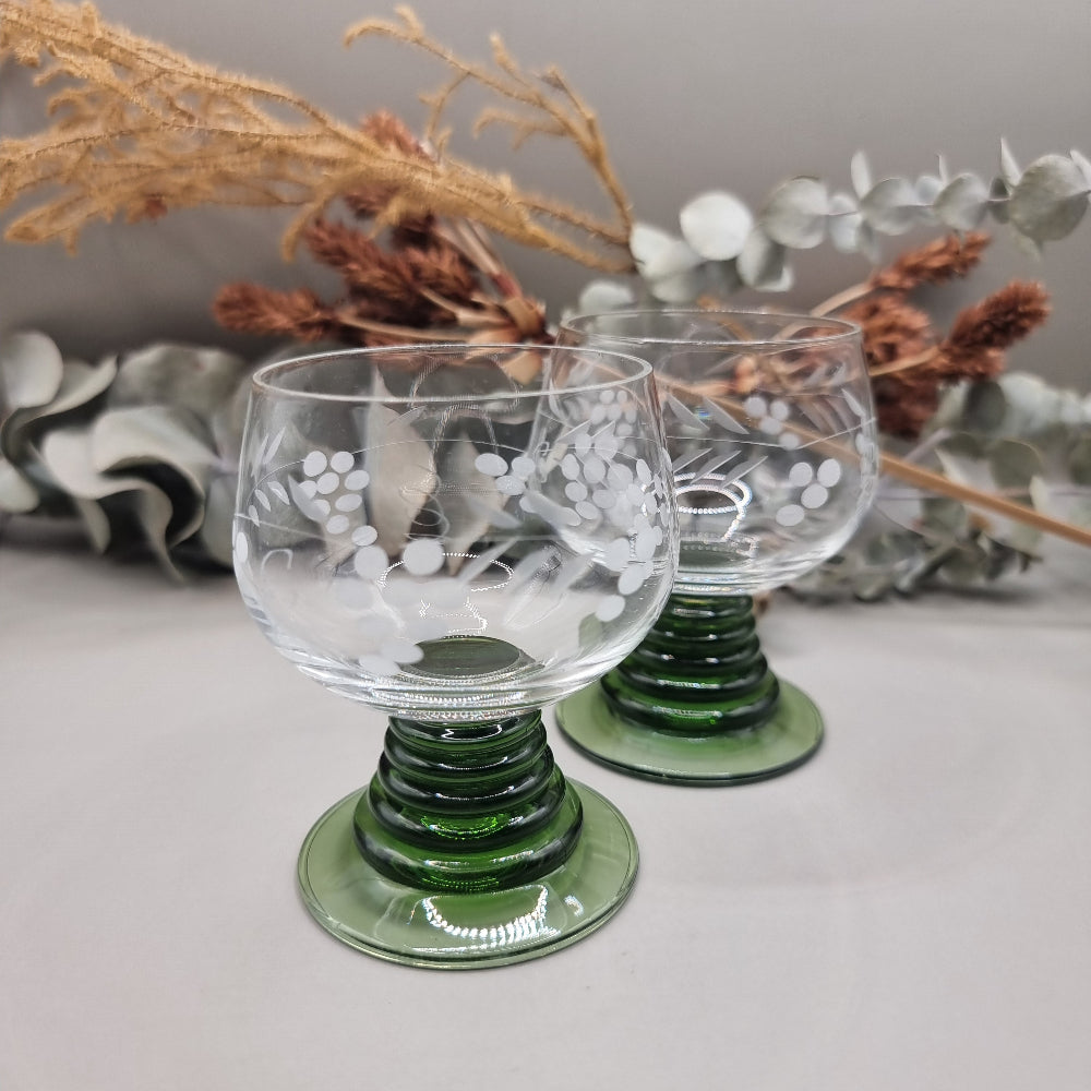 Pair of vintage etched wine glasses with green spiral bases