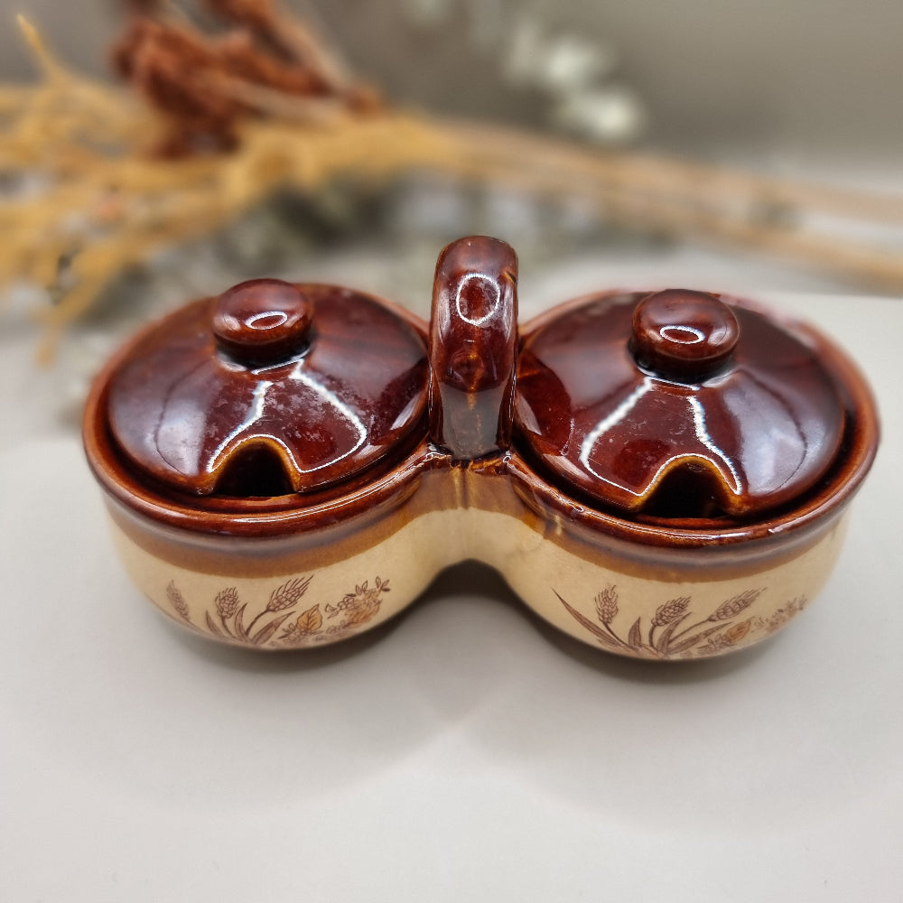 Vintage twin-lidded stoneware condiment pot with wheat sheaf design and brown glaze lids