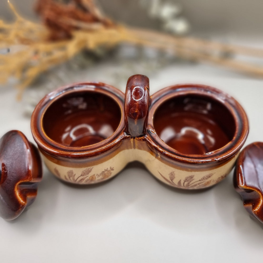 Vintage twin-lidded stoneware condiment pot with wheat sheaf design and brown glaze lids