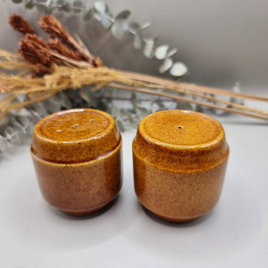 Vintage ceramic salt and pepper shakers in honey brown glaze