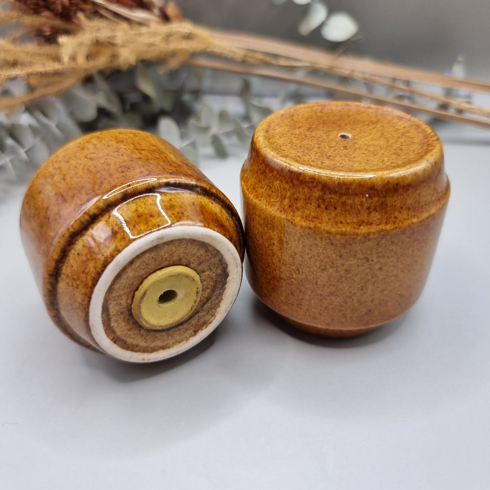 Vintage ceramic salt and pepper shakers in honey brown glaze