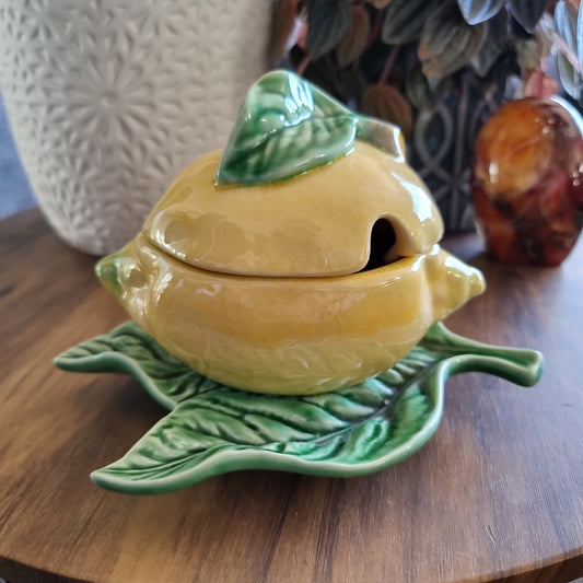 Bordallo Pinheiro lemon-shaped ceramic sugar bowl with green leaf plate, made in Portugal