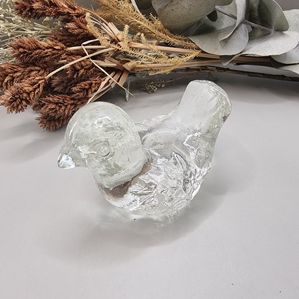 Clear glass bird candle holder with textured detailing