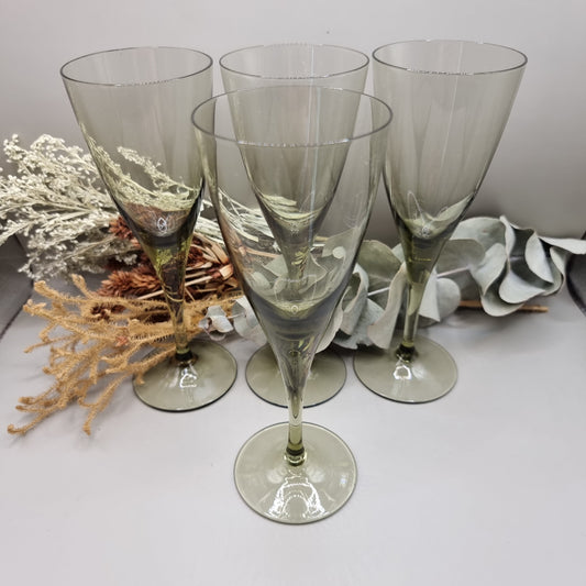 Set of four olive green champagne flutes with tapered stems