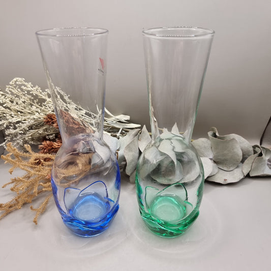Pair of Bormioli Rocco glass vases with blue and green tinted bases.
