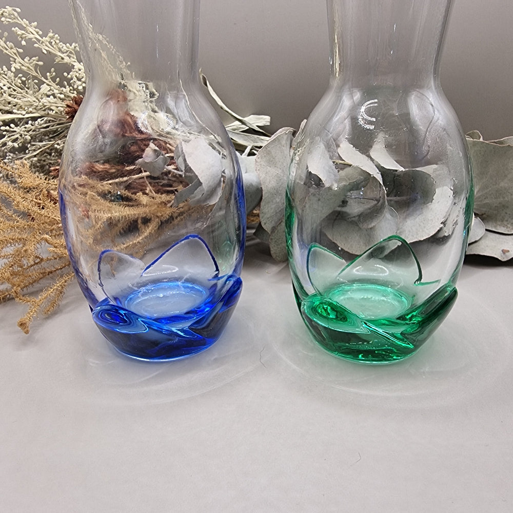 Pair of Bormioli Rocco glass vases with blue and green tinted bases.