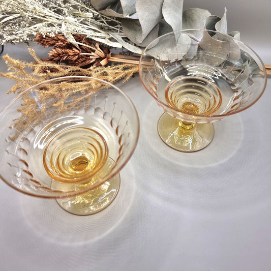 Pair of vintage amber glass dessert coupes with etched detailing