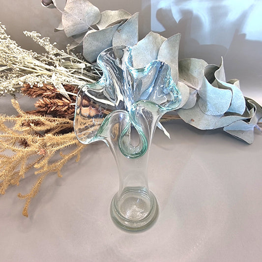 Clear handblown art glass vase with ruffled fluted top