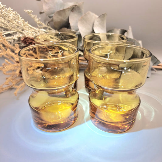 Set of four vintage Crown Crystal amber glasses with anchor design