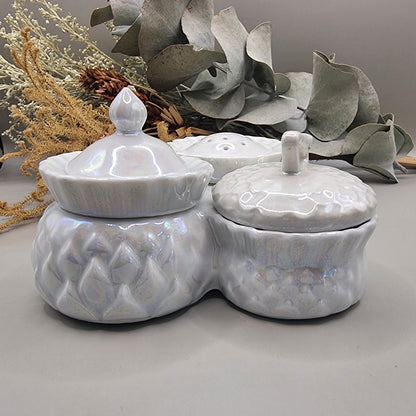 Sparkling vintage ceramic condiment set with pearly glaze. Lidded pots and shaker with central handle.
